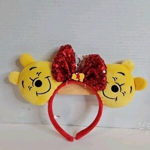 Disney Winnie the Pooh Yellow Ears with Red Sequin Bow